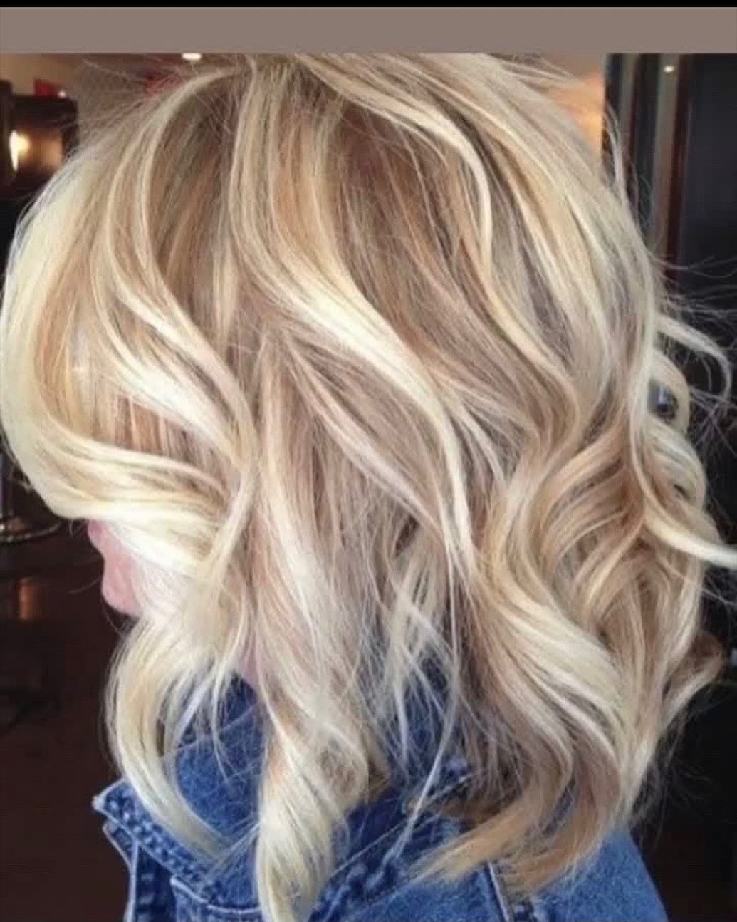 Boucles blondes réalisées au salon